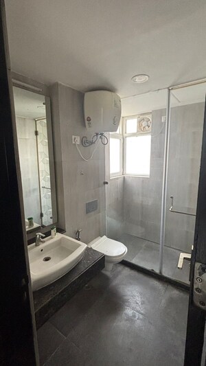 Bathroom in 3 BHK Apartment at Microtek Greenburg, Sector 86 – for Rent