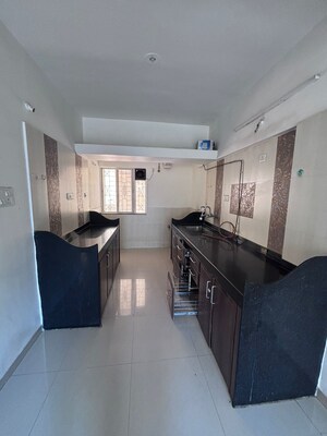 Kitchen in 2 BHK Apartment at GK Rose Icon, Pimple Saudagar – for Rent