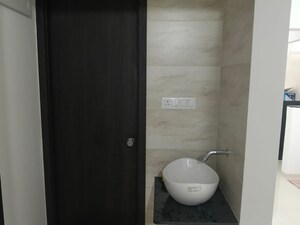 Bathroom in 2 BHK Apartment at Nexus Atrium, Moshi – for Rent