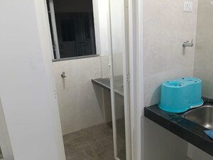 Bathroom in 2 BHK Apartment at Nexus Atrium, Moshi – for Rent