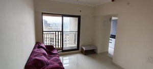 Living Room in 1 BHK Apartment at Lord Sumatinath CHS, Kalyan West – for Rent