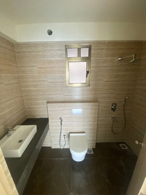 Bathroom in 3 BHK Apartment at Raj Infinia, Malad West – for Rent