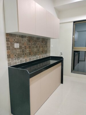 Kitchen in 3 BHK Apartment at Raj Infinia, Malad West – for Rent