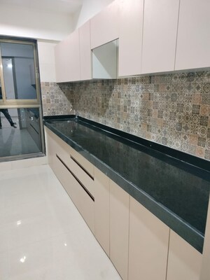 Kitchen in 3 BHK Apartment at Raj Infinia, Malad West – for Rent