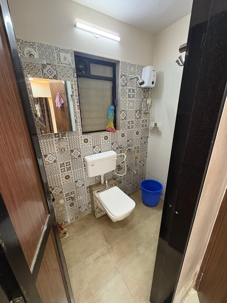 Bathroom, raunak-unnathi-woods-phase-7-a-and-b 1 Bedroom 560 Sq.Ft. Apartment In Ghodbunder Road Thane 10414941