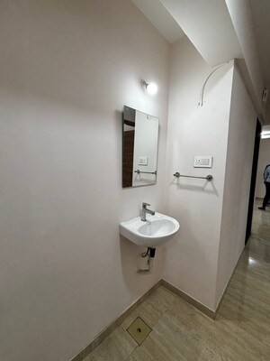 Bathroom in 2 BHK Apartment at Je And Vee Om Trimurti, Malad East – for Rent