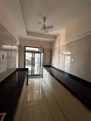 Kitchen in 2 BHK Apartment at Je And Vee Om Trimurti, Malad East – for Rent