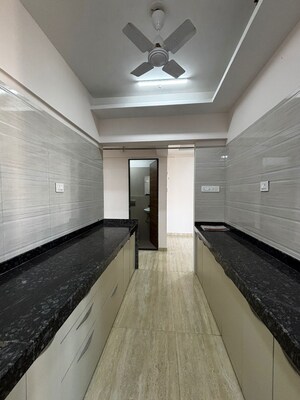 Kitchen in 2 BHK Apartment at Je And Vee Om Trimurti, Malad East – for Rent