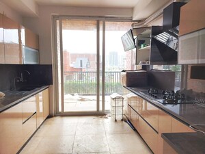 Kitchen in 4 BHK Apartment at Emaar Orange Castle, Gomti Nagar – for Rent