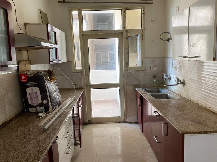 Kitchen, singla-south-city 3 Bedroom 1500 Sq.Ft. Apartment In Lohgarh Zirakpur 10415104