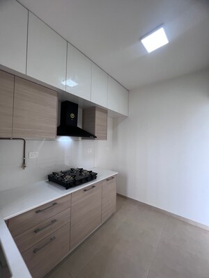 Kitchen in 2 BHK Apartment at Bhartiya Nikoo Homes Phase 2, Thanisandra Main Road – for Rent