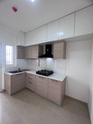 Kitchen in 2 BHK Apartment at Bhartiya Nikoo Homes Phase 2, Thanisandra Main Road – for Rent