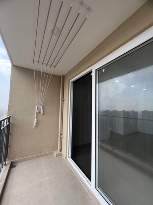 Balcony in 2 BHK Apartment at Bhartiya Nikoo Homes Phase 2, Thanisandra Main Road – for Rent