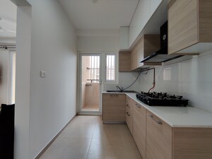 Kitchen in 2 BHK Apartment at Bhartiya Nikoo Homes Phase 2, Thanisandra Main Road – for Rent