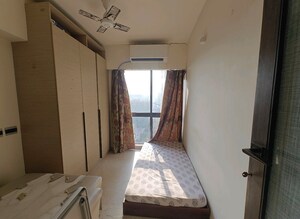 Bedroom in 2 BHK Apartment at Omkar Vive, Kurla – for Rent
