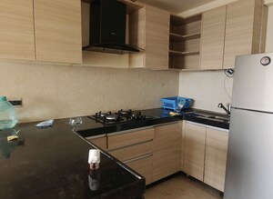 Kitchen in 2 BHK Apartment at Omkar Vive, Kurla – for Rent