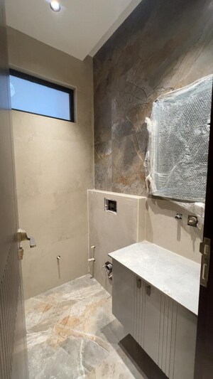 Bathroom in 4 BHK Builder Floor at Ashok Vihar – for Sale