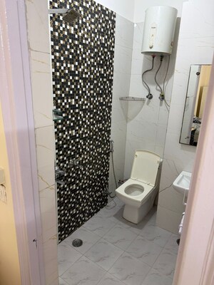 Bathroom in 2 BHK Apartment at Arun Vihar Sector 37, Sector 37 – for Rent