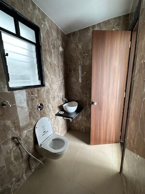 Bathroom in 2 BHK Apartment at Unique Youtopia, Kharadi – for Rent
