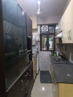 Kitchen in 2.5 BHK Apartment at Aims Golf City, Sector 75 – for Rent