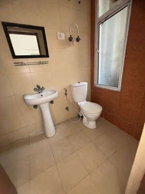 Bathroom in 3 BHK Apartment at Mahagun My Woods, Sector 16c Greater Noida – for Sale