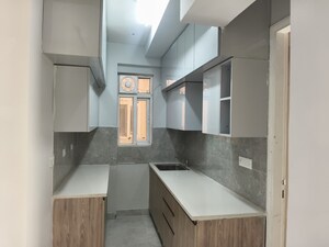 Kitchen in 2 BHK Apartment at Signature Global City, Sector 37d – for Rent