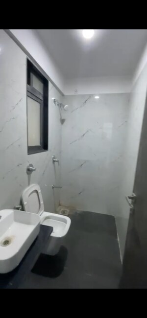 Bathroom in 2 BHK Apartment at Dev Leo Tower, Oshiwara – for Rent