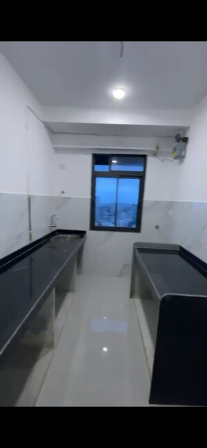 Kitchen in 2 BHK Apartment at Dev Leo Tower, Oshiwara – for Rent