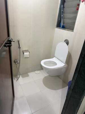 Bathroom in 1 BHK Apartment at Puranik City, Kasarvadavali – for Rent