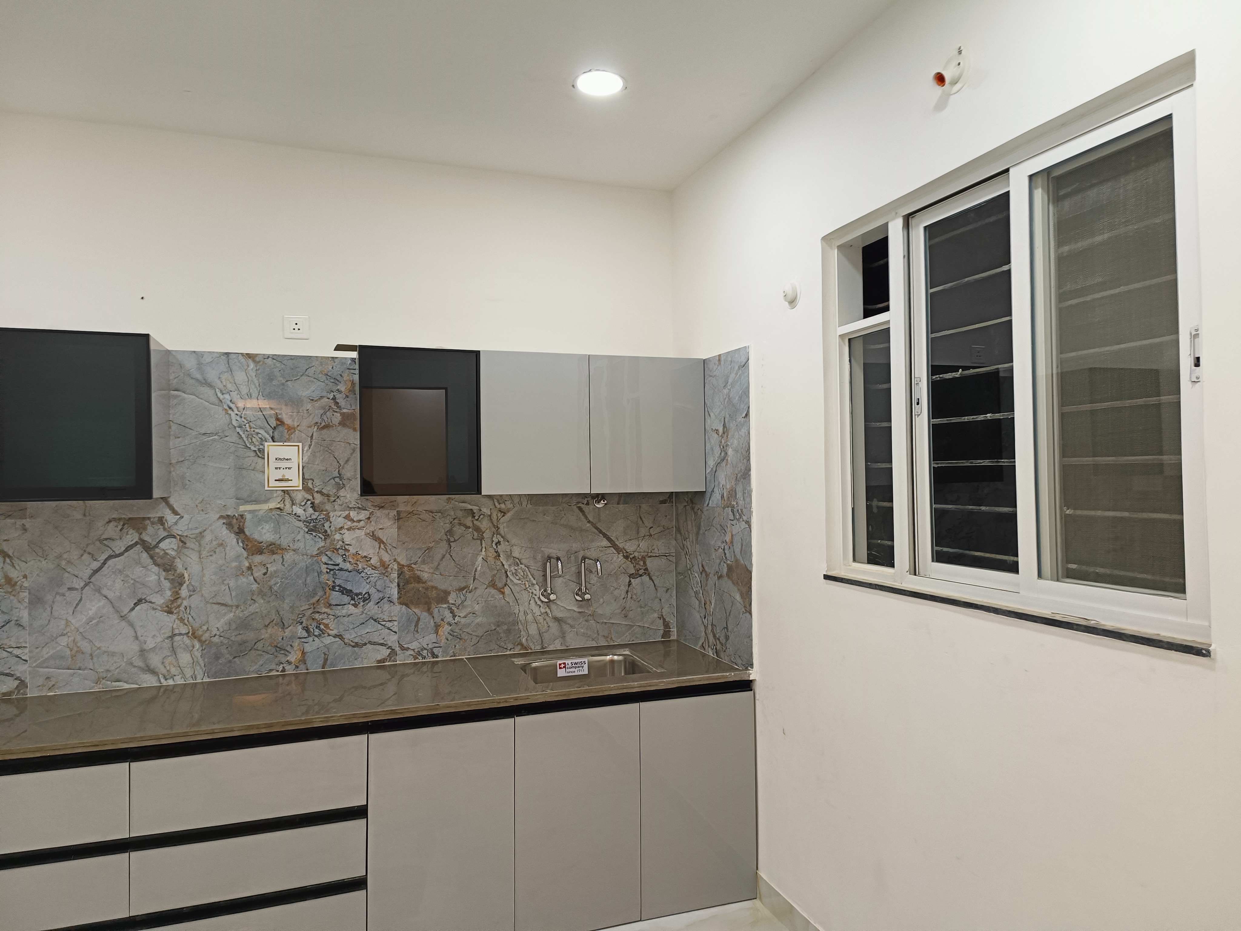 Kitchen, silver-silver-9 1 Bedroom 465 Sq.Ft. Apartment In Moshi Pune 10430243
