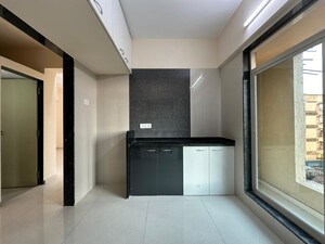 Kitchen in 3 BHK Apartment at Gautam Nagar – for Sale