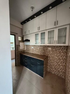 Kitchen in 2 BHK Apartment at AWHO 8B, Vrindavan Yojna – for Rent