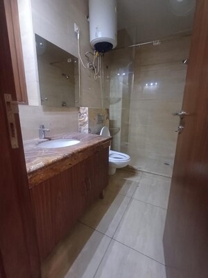 Bathroom in 3 BHK Builder Floor at Pamposh Enclave – for Rent