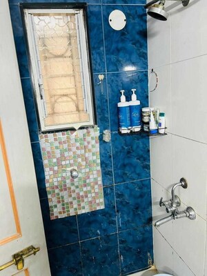 Bathroom in 2 BHK Apartment at Kunal Iconia, Mamurdi – for Rent