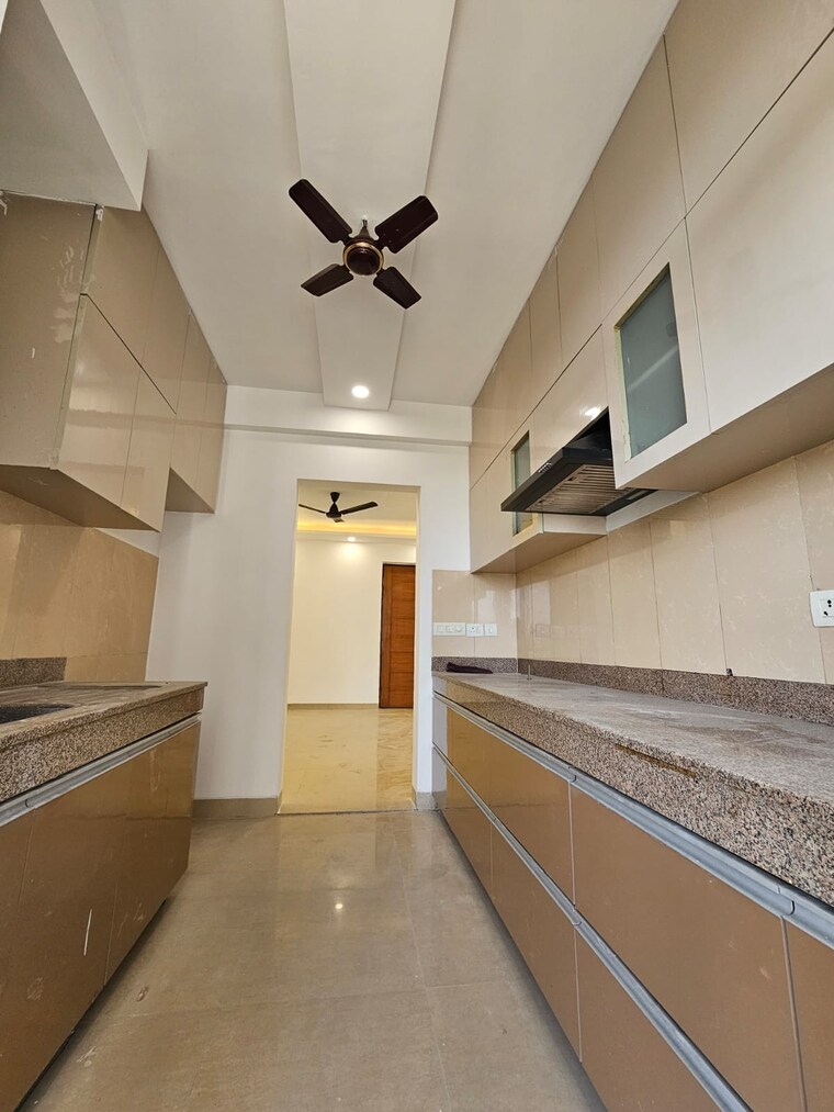 Kitchen, emaar-emerald-estate 3.5 Bedroom 1395 Sq.Ft. Apartment In Sector 65 Gurgaon 10443821
