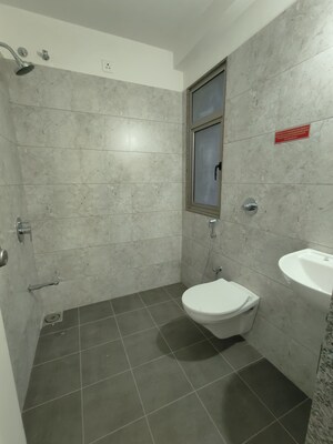 Bathroom in 3 BHK Apartment at Goyal Orchid Valley, Shela – for Rent