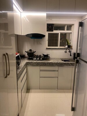 Kitchen in 2 BHK Apartment at Videocon Laxmi Narayan Krupa, Vile Parle West – for Rent
