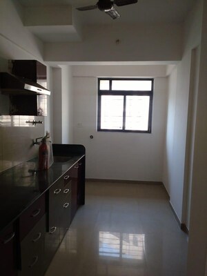 Kitchen in 2 BHK Apartment at Puranik City, Kasarvadavali – for Rent