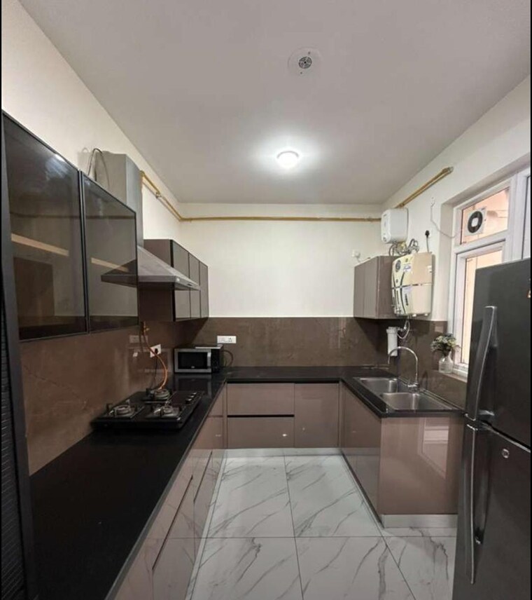 Kitchen, aura-gazania 3 Bedroom 1800 Sq.Ft. Apartment In Nabha Zirakpur 10494169