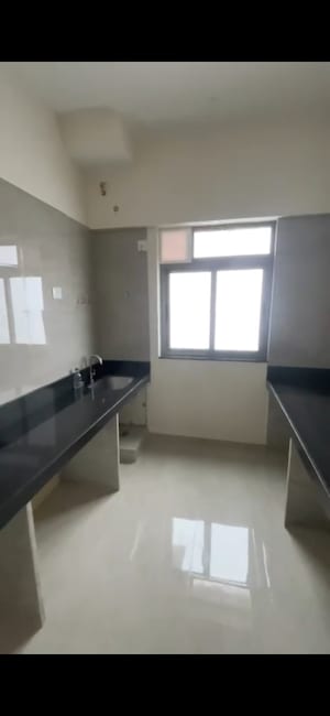 Kitchen in 2 BHK Apartment at Sheth Auris Serenity Tower 3, Malad West – for Rent