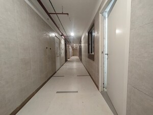 Building Lobby in 2 BHK Apartment at Arihant Aspire, Palaspe Phata – for Rent