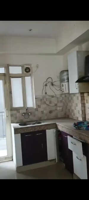 Kitchen in  Apartment at Radicon Vedantam, Sector 16c Greater Noida – for Rent