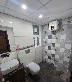 Bathroom in 3 BHK Apartment at The Ananta Aspire, Utrathiya – for Rent