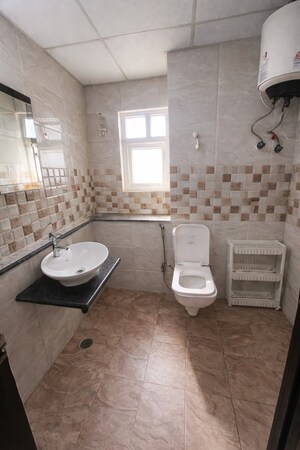 Bathroom in 2.5 BHK Apartment at Mahagun Mirabella, Sector 79 – for Rent