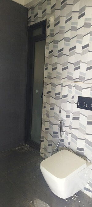 Bathroom in 1 BHK Apartment at Damji Shamji Mahavir Spring Tulip Phase 1, Pokhran Road No Two – for Rent