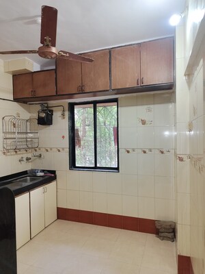 Kitchen in 1 BHK Apartment at Laxmi Park Phase 1 A Wing, Lokmanya Nagar – for Rent