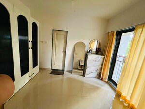 Living Room in 2 BHK Apartment at Vengurlekars Chaitra, Andheri West – for Rent