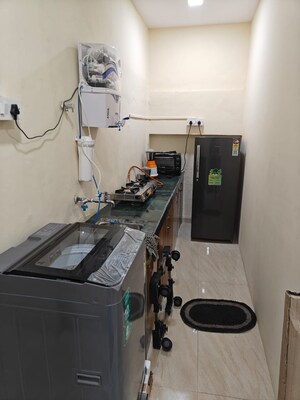 Kitchen in  Pg at Naupada – for Rent