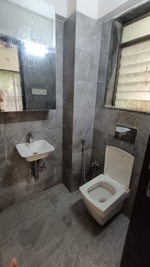 Bathroom in 2 BHK Apartment at Pratham ARC Aura, Andheri West – for Rent