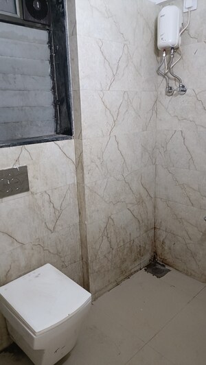 Bathroom in 2 BHK Apartment at Pratham ARC Aura, Andheri West – for Rent
